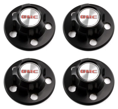 JUEGO DE 4 TAPAS CENTRALES DE CUBO DE RUEDA DE ACERO NEGRO GMC SAFARI VAN 1985-1995 OEM Foto 1 de 4