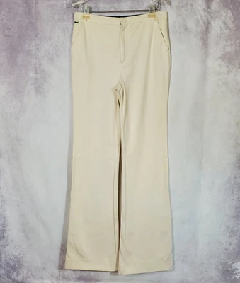 Pantalones acampanados delanteros planos LACOSTE para mujer marfil talla 42 entrepierna EE. UU. 8 34" Foto 1 de 4