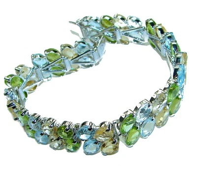 Brazalete hecho a mano de plata de ley 925 con topacio azul suizo de 68,5 quilates con piedras preciosas Foto 1 de 4