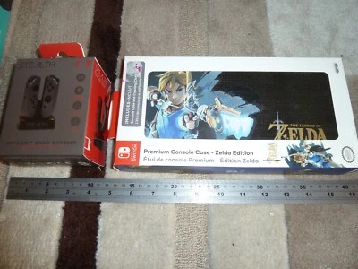 NINTENDO SWITCH OFFICIAL PREMIUM CONSOLE CARRY CASE ZELDA + 4 JOYCON CHARGER NEW - Image 1 of 2