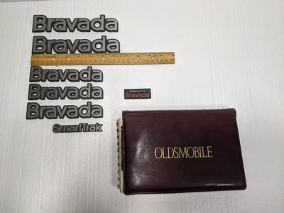 1991-1994 OLDSMOBILE OLDS BRAVADA EMBLEMS BADGES DECALS OWNERS MANUAL BOOK GLOVE - Image 1 of 4