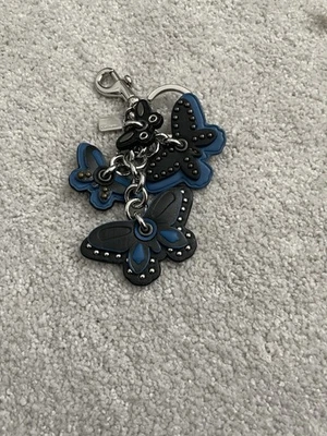 COACH Dije Mariposa Cuero Azul Llavero Dije Mariposa Silueta Foto 1 de 2