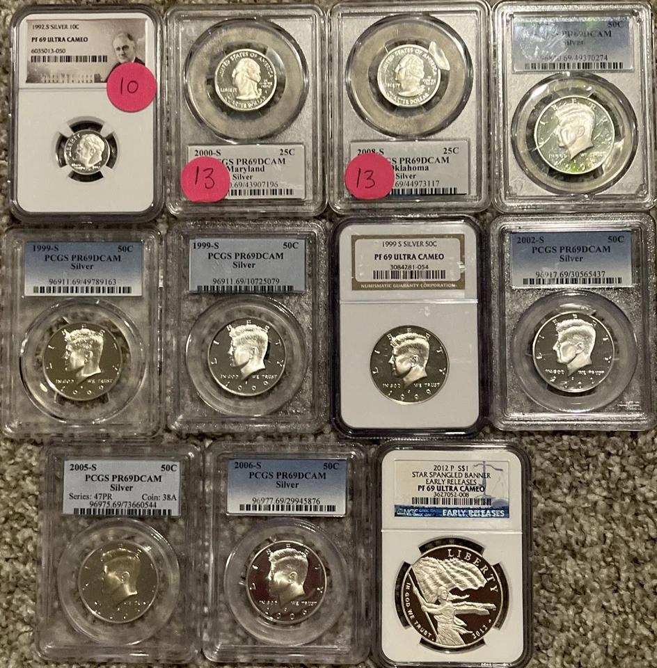 Lote de 69 monedas de plata en losa de prueba Foto 1 de 1