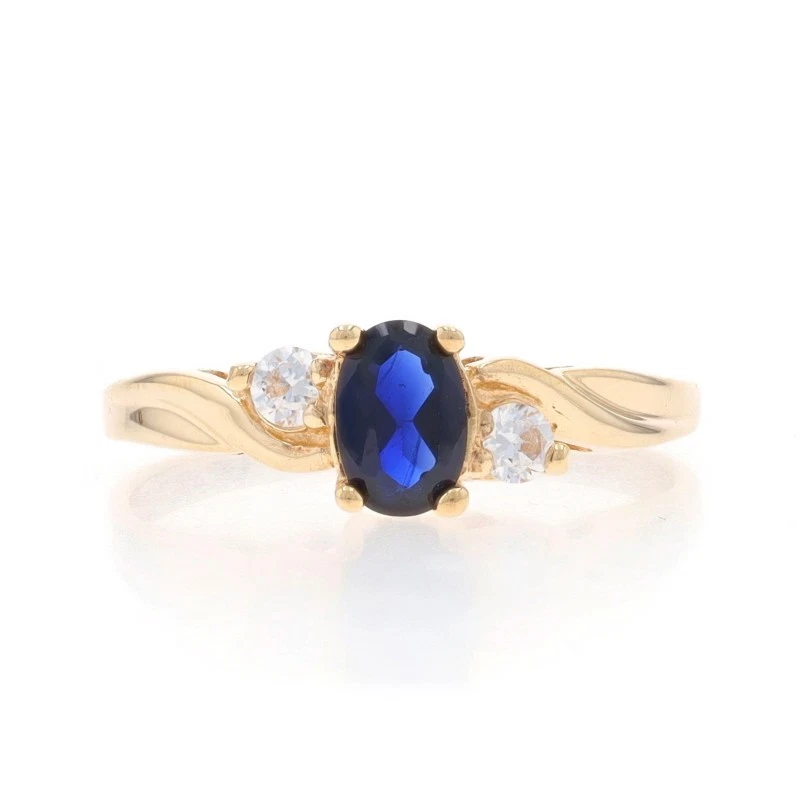 Yellow Gold Lab-Created Sapphire & Cubic Zirconia Bypass Ring - 10k Oval .72ctw - Image 1 of 4