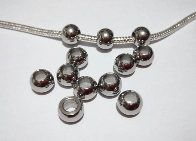 10pz perline distanziali acciaio inox tondo 8x6mm foro 4mm colore argento scuro - Immagine 1 di 1