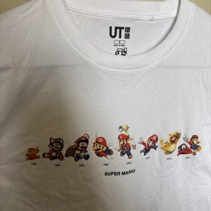 Camiseta Uniqlo UT Super Mario Bros 35 Aniversario Nintendo Blanca S/S Pequeña - Imagen 1 de 14