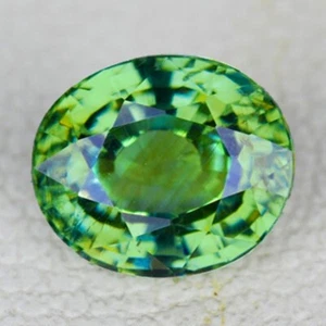 5x4.5 mm {0.64 cts} Oval AAA Fire Rainbow Green Demantoid Garnet {IF-VVS} - Picture 1 of 2