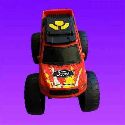 Camión motorizado Dickie Toys rojo Ford Raptor Wheelie Raiders probado en Alemania Foto 1 de 4