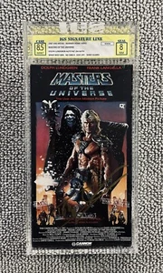 IGS 8.5/8 MASTERS OF THE UNIVERSE / FIRST PRINT **JSA DOLPH LUNDGREN AUTO** VHS - Imagen 1 de 3