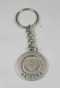 Kokopelli spinner swivel ARIZONA KEYCHAIN vintage metal state keychain used - Picture 1 of 2