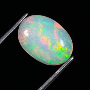 Natural Ethiopian Multi Fire opal Oval Cabochon Loose Gemstone 8x6MM - Picture 1 of 11