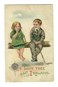 Vintage St Patrick's Day Postcard Young Boy and Girl Sitting on Fence - Picture 1 of 2