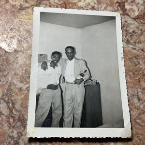 vintage snapshot of two African American men posing indoors With Alcohol In Hand - Picture 1 of 2