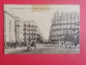 CPA 34 MONTPELLIER - Rue Nationale et Palais de Justice - Imagen 1 de 2