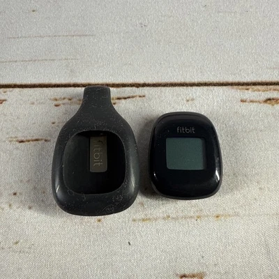 Rastreador de actividad inalámbrico Fitbit con cremallera negro clip usado probado   Foto 1 de 3