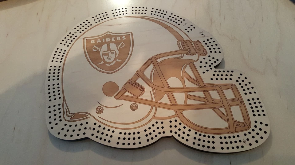 Casco de fútbol americano Oakland Raiders tabla de cuna de tres pistas Foto 1 de 1