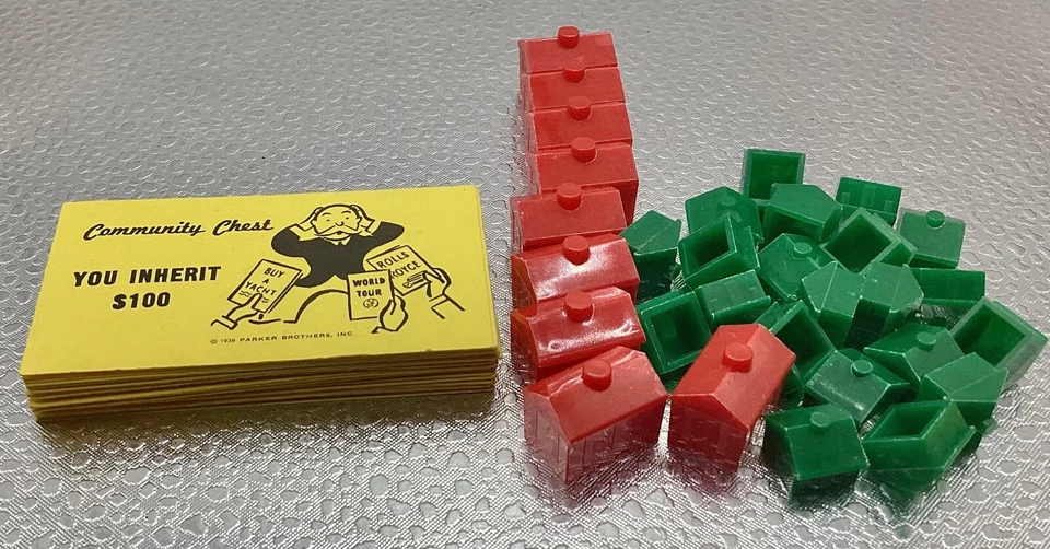 Vintage 1961 Monopoly 21 casas, 9 hoteles y 21 piezas de repuesto comunitarias T1 Foto 1 de 1