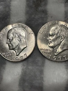 2 1977 No mint mark Ike dollars doubling - Picture 1 of 5