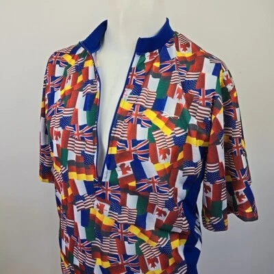 Camiseta deportiva de ciclismo Reebok vintage con estampado de bandera internacional para hombre M hecha en EE. UU. S/S Foto 1 de 4