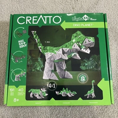 Rompecabezas 3D Thames and Kosmos Creatto Light Up Dino Planet 4 en 1 verde gris Foto 1 de 4