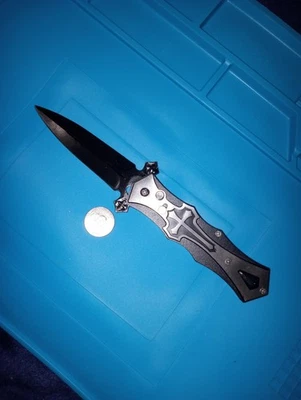 Navaja de bolsillo de acero inoxidable con bloqueo de botón de apertura asistida mango de metal Foto 1 de 3