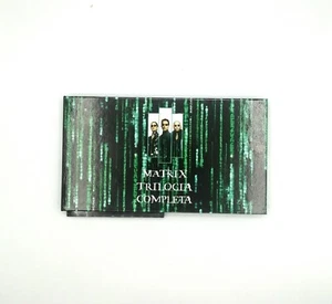 "MATRIX TRILOGIE KOMPLETT" 3 DVD + 17 FOTOS (Herstellungsfehler im Etui - Bild 1 von 2