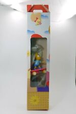 VINTAGE GREEK EASTER CANDLE WITH PULL BACK PLASTIC TOY BART SIMPSON ON SKATE