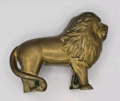 Banco de monedas vintage/antiguo metal fundido latón/bronce león tornillo plano animales  Foto 1 de 4