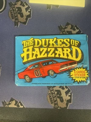 The Dukes of Hazzard 1981 paquete de cera sellado sin abrir Donruss General Lee Foto 1 de 2