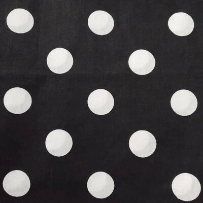 LUNARES BLANCOS SOBRE TELA DE POLIALGODÓN NEGRO PUNTO DE UNA PULGADA 58" POR YARDA  Foto 1 de 4