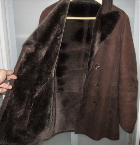 Giacca di pelle Gucci Mouton nera taglia grande usata in ottime condizioni