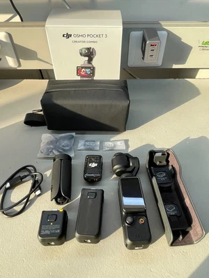 DJI Osmo Pocket 3 Creator Combo 1 Inch CMOS Pocket Gimbal Camera 4K 120fps - Image 1 of 4