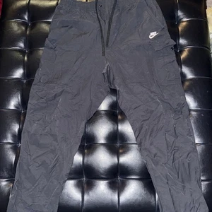 Nike Cargohose Schwarz Herren Kordelzug Tech Woven - Bild 1 von 4
