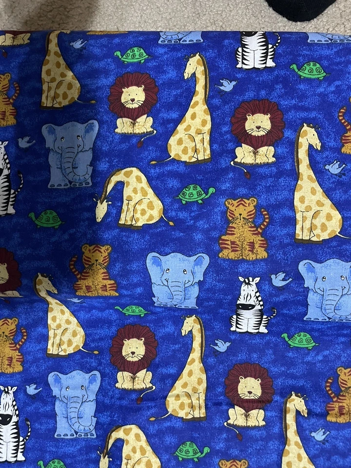 Animal Print Lion, Giraffe, giraffe, On Mottled Blue Fabric BTY Free Shipping - Image 1 of 1