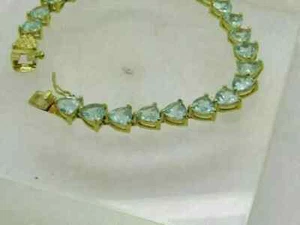 12Ct Trillion Cut Lab-Created Aquamarine 14K Yellow Gold Plated Tennis Bracelet - Picture 1 of 3