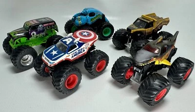 Hot Wheels MONSTER JAM TRUCK Lot 5 Captain America, Grave Digger, Megalodon - Image 1 of 4