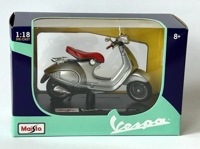 Maisto 1/18  Vespa 946 Bellissima 2014 model scooter in silver/red #39540 1:18 - Image 1 of 2