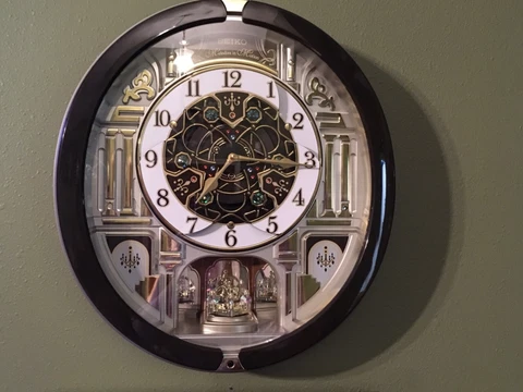 Seiko Melodies in Motion Crystal Embellished Wall Clock Plays 40 Melodies NIB Cover