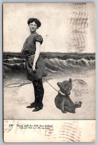 Daisy With Her Little Bear Behind Victorian Woman on Beach Antique Postcard D27 - Picture 1 of 4