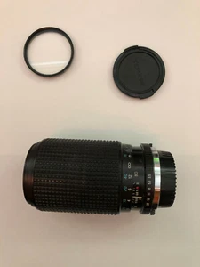 Tokina Objektiv 80-200mm F3,5-4,5, für Olympus, gebraucht & UV-390-Filter - Bild 1 von 5