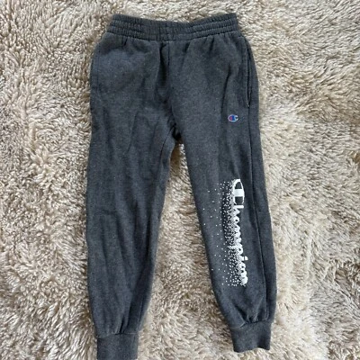 Pantalones deportivos de vellón marca Champion para niños - talla 6 grises con bolsillos Foto 1 de 3