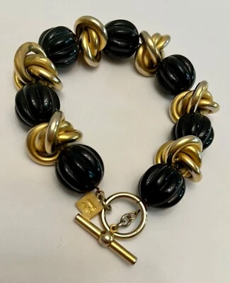 "BRAZALETE ANNE KLEIN TONO DORADO GRUESO NEGRO CON CUENTAS DECLARACIÓN 8"" Cierre de palanca" Foto 1 de 4