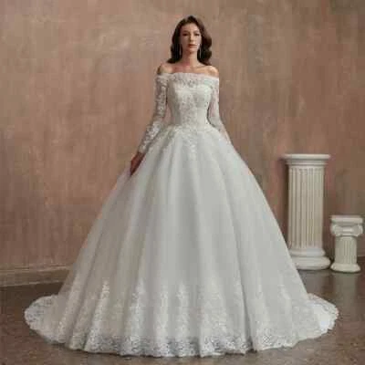 Elegant A-Line Wedding Dresses Boat Neck Long Sleeved Lace Applique Bridal Gowns - Image 1 of 4