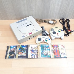 Sega Saturn Japanese white console bundle with 3D Multi Controller & 5 Games