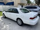 1999 Toyota Camry LE 76289 MILES 1999 WHITE TOYOTA CAMRY-16" TIRES-SOUND ENGINE-LOW PRICING