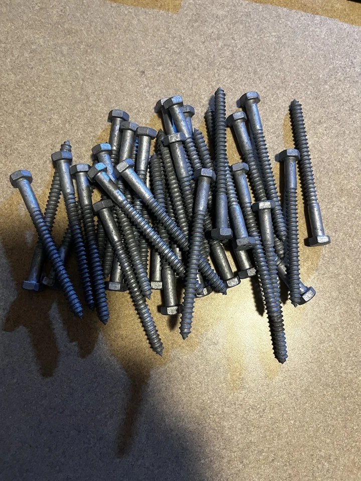 Hillman 5/16" X 4" Galvanized lag Screws 1/2" Head 34 Piece Lot - Image 1 of 1