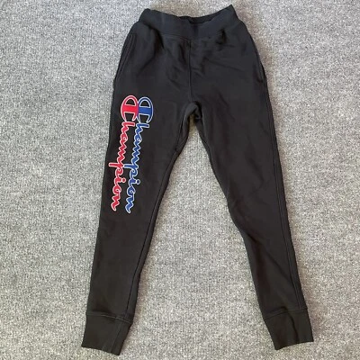 Pantalones deportivos Champion para hombre pequeños tejidos inversos negros logotipo deletreado P1 Foto 1 de 4
