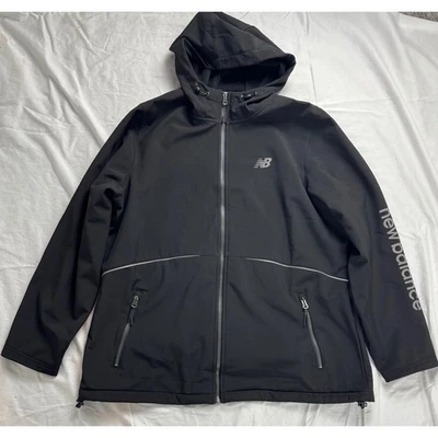 Chaqueta deportiva de rendimiento New Balance para mujer 1X negra con capucha y cremallera Foto 1 de 4