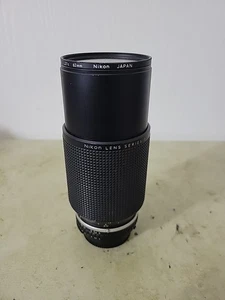 Nikon Series E Zoom 70-210 mm F/4 AiS MT messa a fuoco manuale e filtro obiettivo 62 mm L37C usato in ottime condizioni - Foto 1 di 7