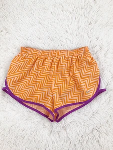 Nike Dri-Fit Orange Chevron Zig Zag Print Running Shorts Size XS - Picture 1 of 6